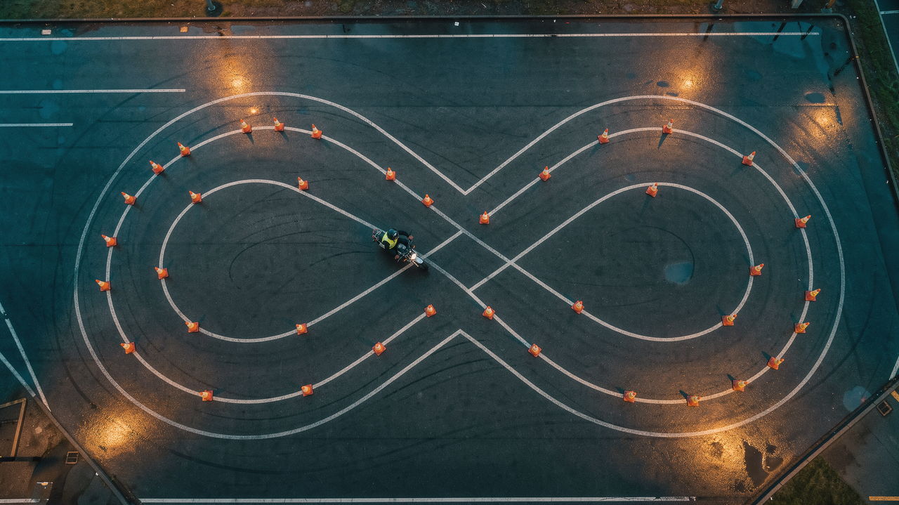 Aerial view of a figure-of-eight laid out with cones on a training pad